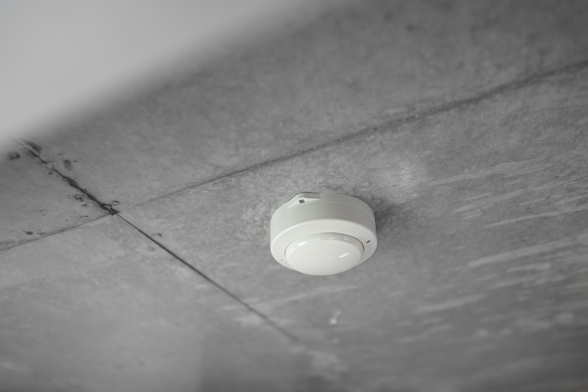 Smoke detector installed on a ceiling